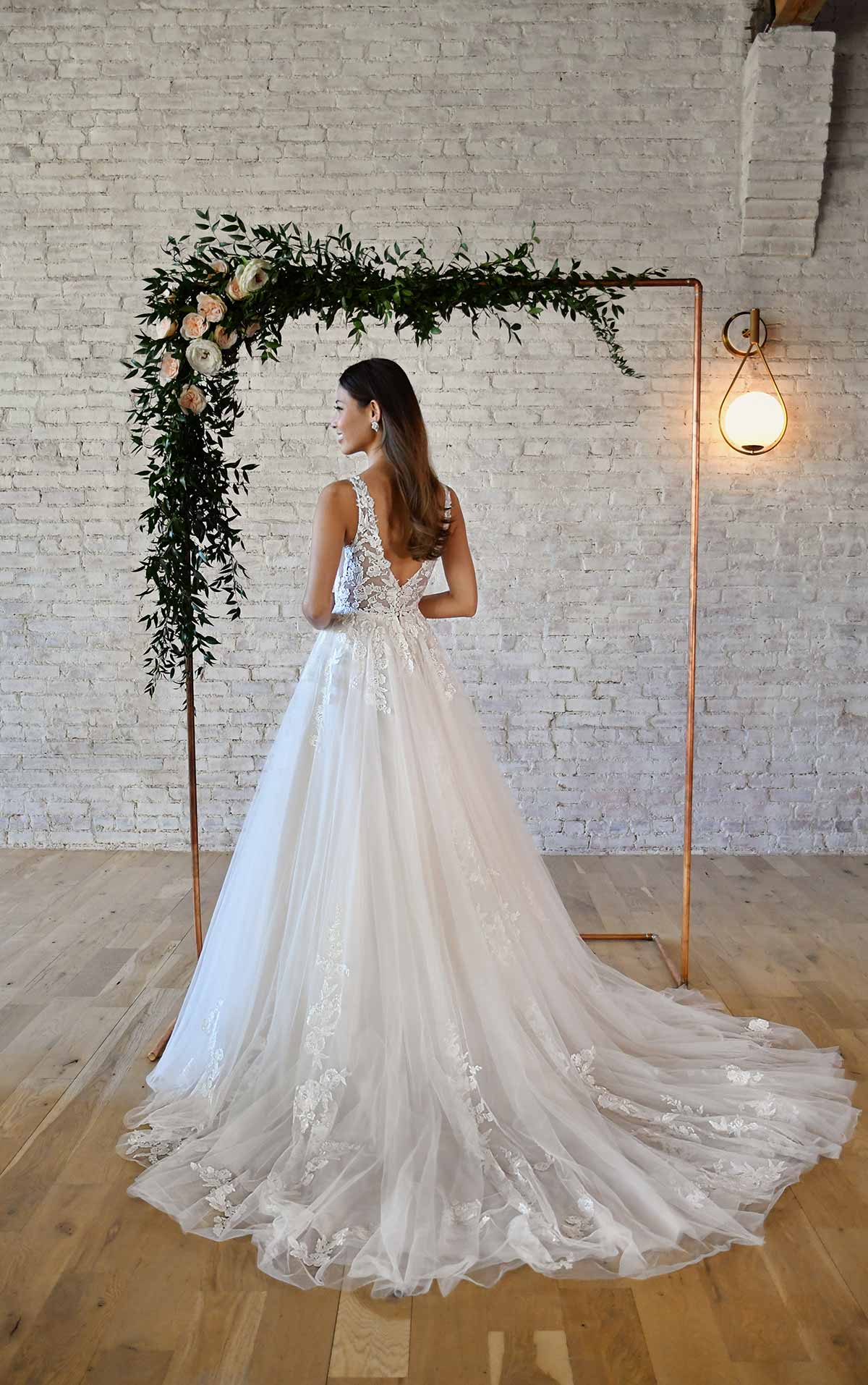 7194 Floral Lace Wedding Dress with Plunging V-Neckline  by Stella York